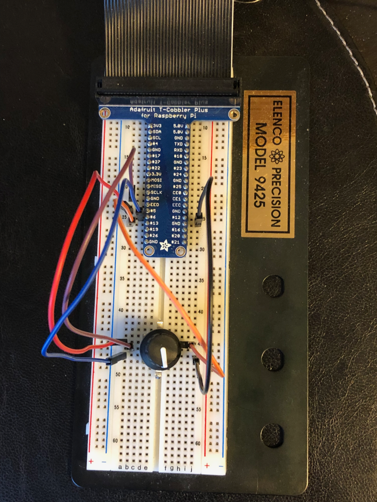 Breadboard connected to a Raspberry Pi and Cobbler breakout board