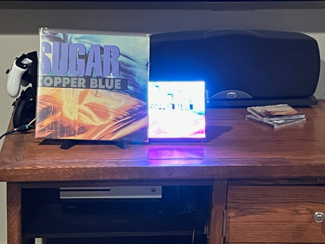 Sugar’s Copper Blue album standing up  next to itself displayed on a 64 by 64 matrix
